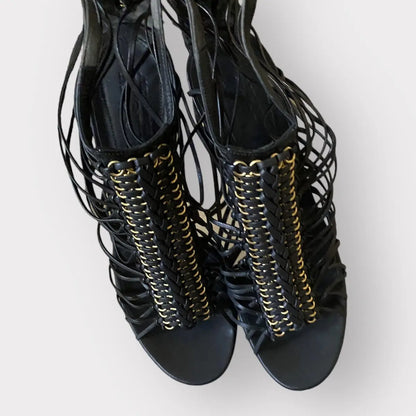 Alexander McQueen - Strappy platform black leather w/gold tone stiletto heels