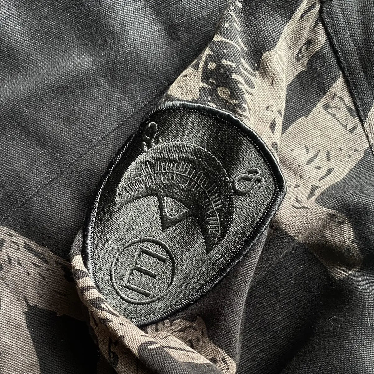 Undercover : SS03 Scab “Drunkard” Patch Work M65 Jacket