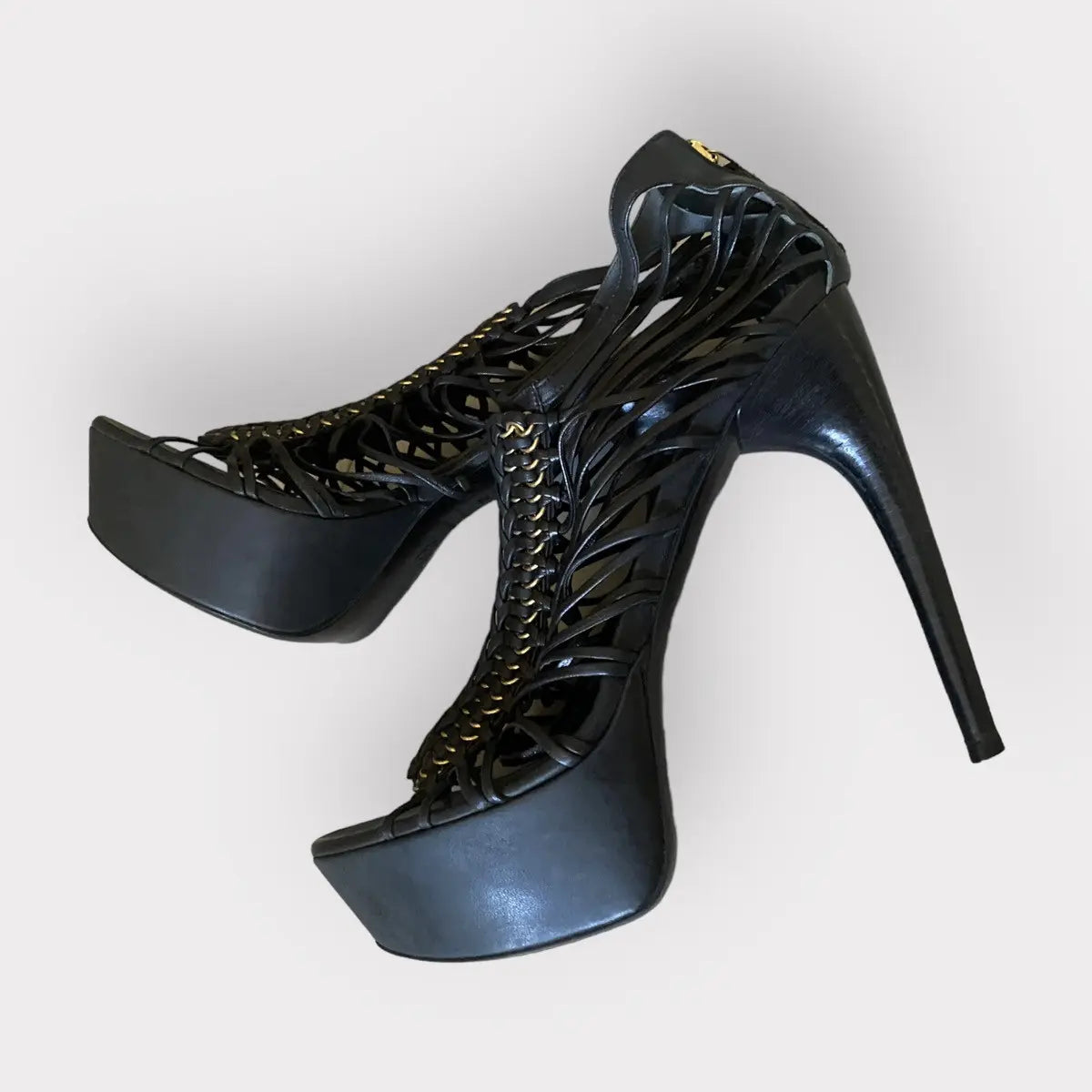 Alexander McQueen - Strappy platform black leather w/gold tone stiletto heels