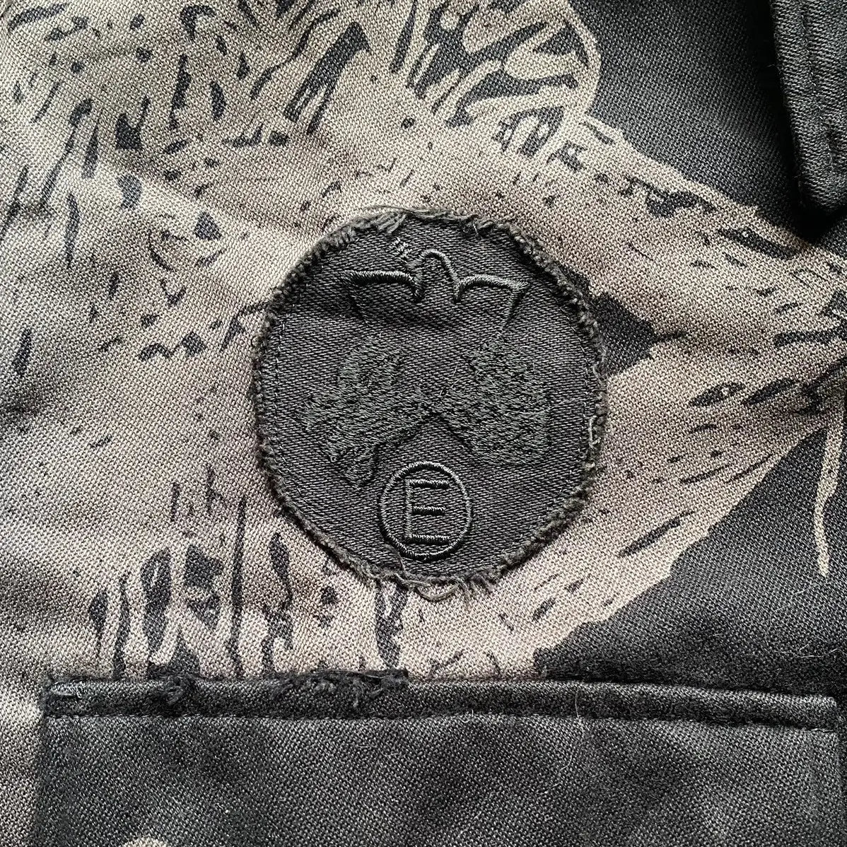 Undercover : SS03 Scab “Drunkard” Patch Work M65 Jacket