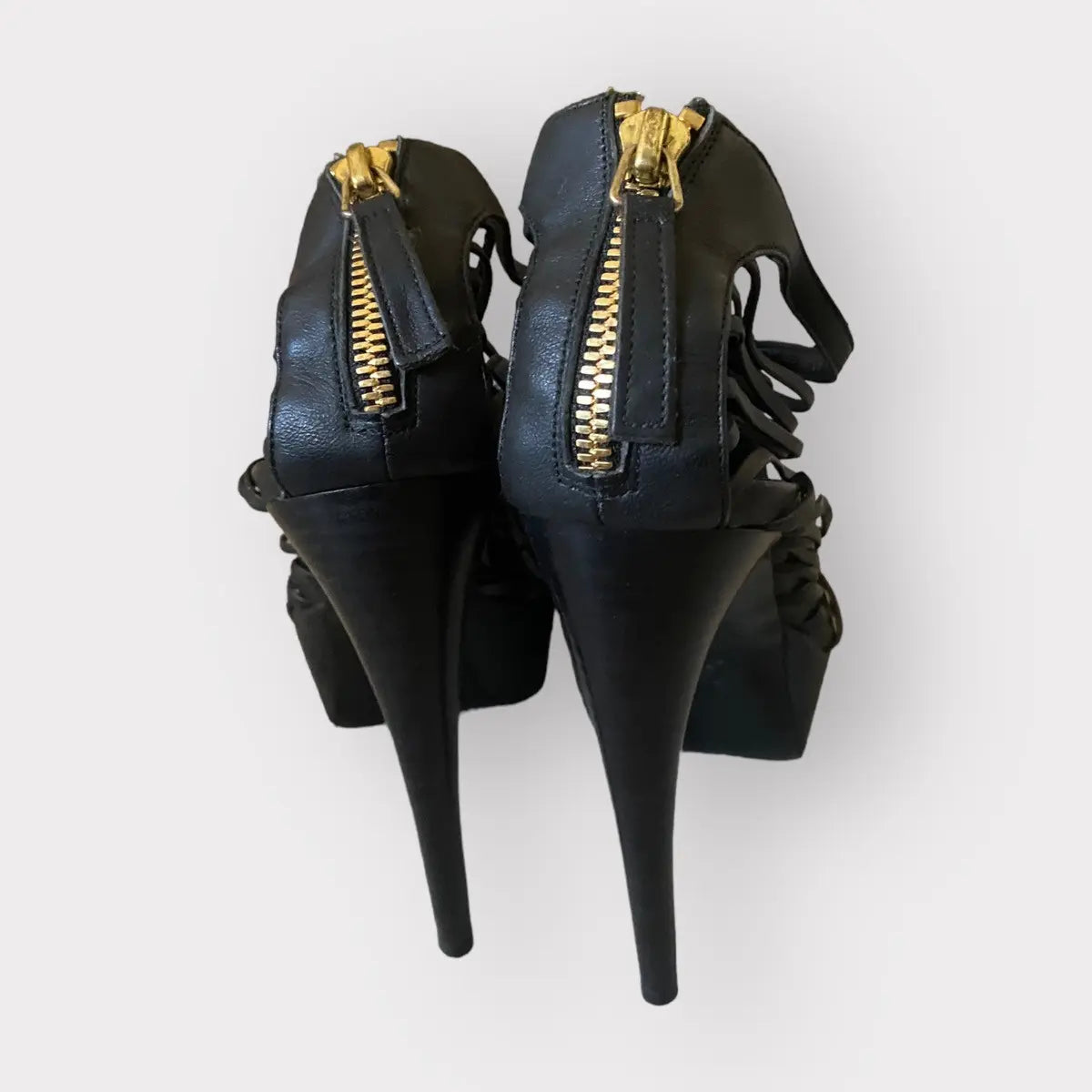 Alexander McQueen - Strappy platform black leather w/gold tone stiletto heels