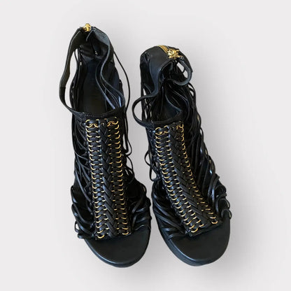 Alexander McQueen - Strappy platform black leather w/gold tone stiletto heels