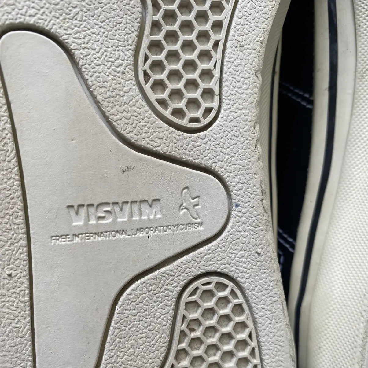 Visvim - Black High Top Sneakers by Sophnet