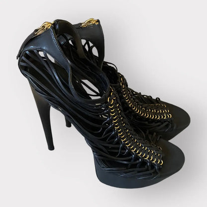 Alexander McQueen - Strappy platform black leather w/gold tone stiletto heels